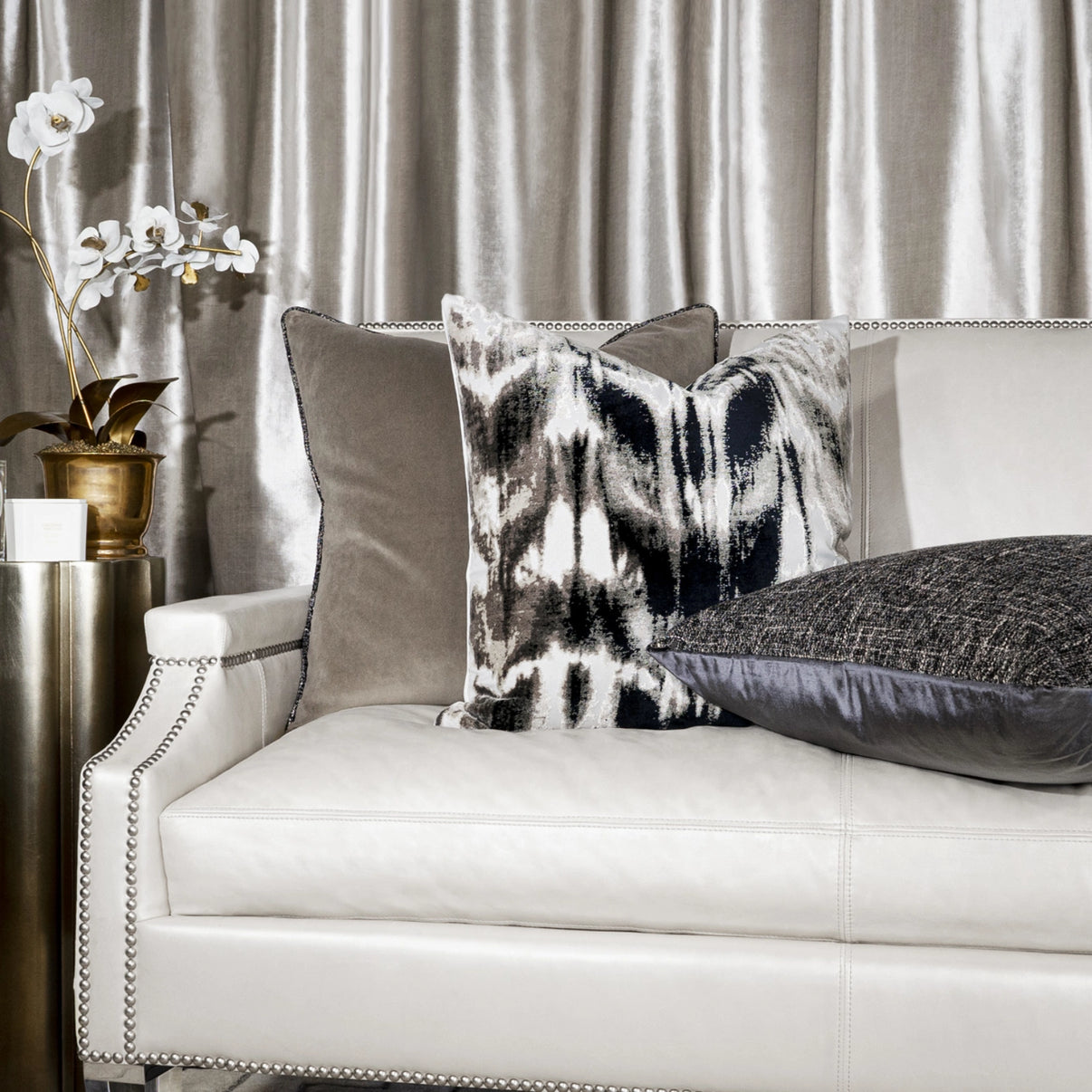 Inblock/Shadow pillow on white leather couch